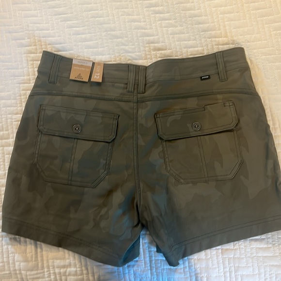 NWT Camo green shorts with a lot of stretch. Zip up with button. - Picture 2 of 5
